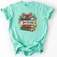 First Grade Bookstack Banner Tee in Island Reef
