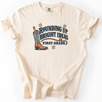 Rounding Up Bright Ideas First Grade Tee in Ivory