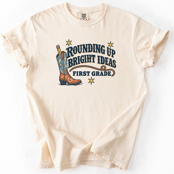 Rounding Up Bright Ideas First Grade Tee in Ivory